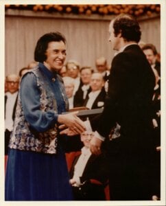 A woman receiving a prize