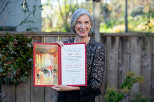 Jennifer A. Doudna showing her Nobel Prize diploma.
