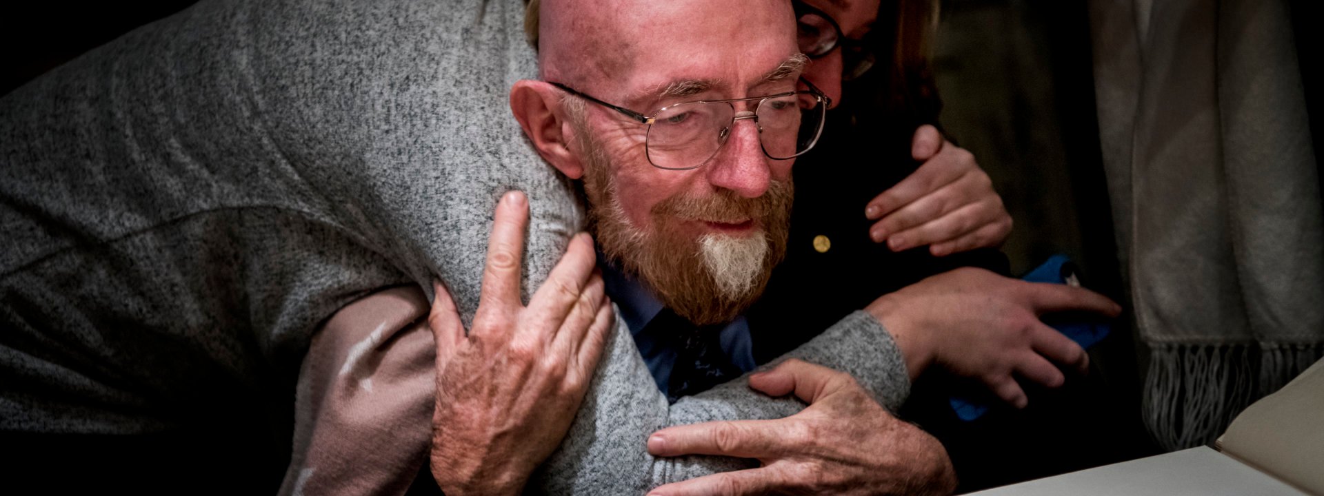 Kip Thorne at the Nobel Foundation reading the guestbook
