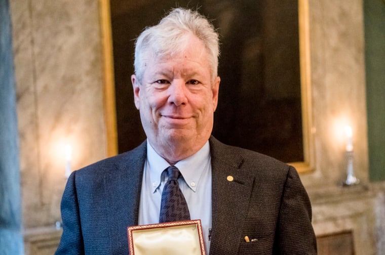 Richard H. Thaler showing his medal