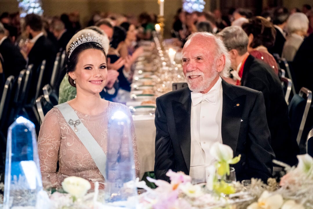 A man and a woman sitting at a festive table