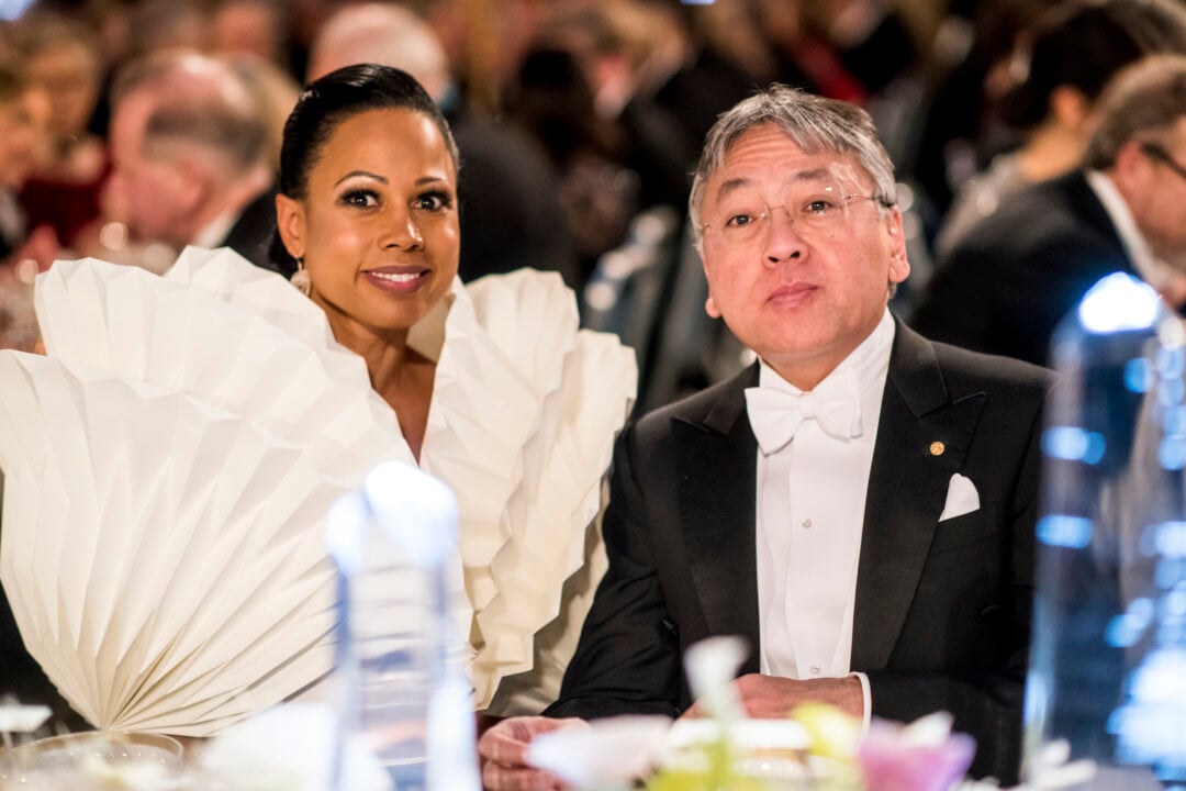 A man and a woman sitting at a festive table