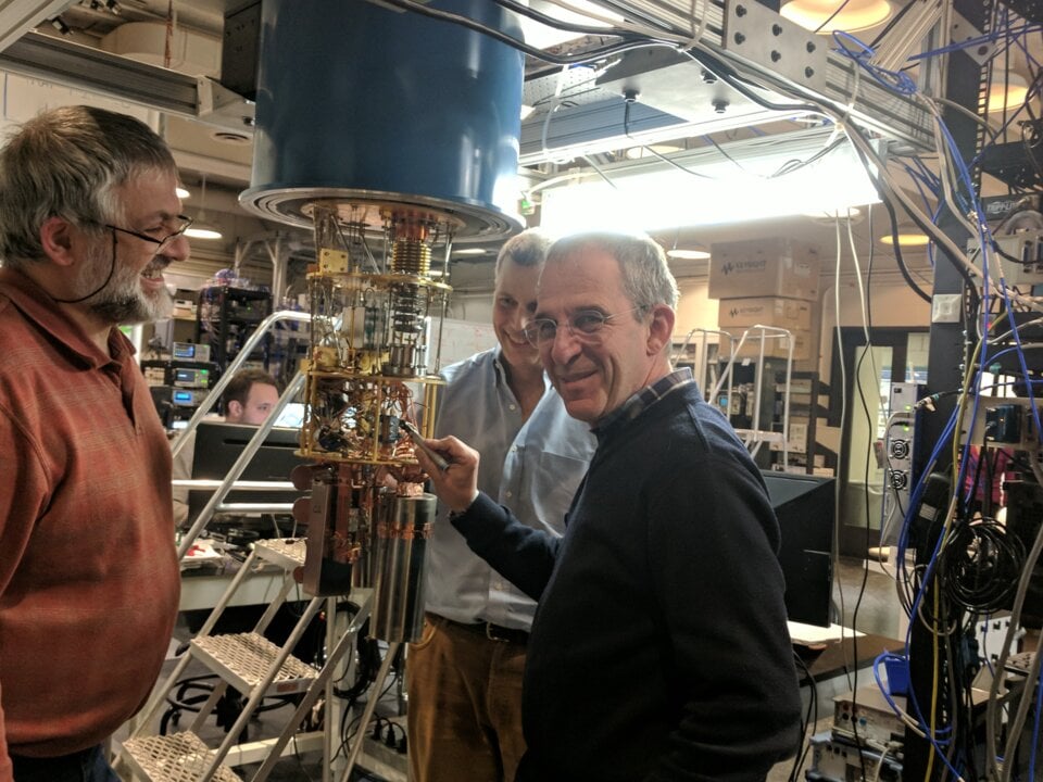A man in front of a quantum computer