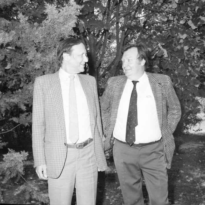 Two men looking at each other