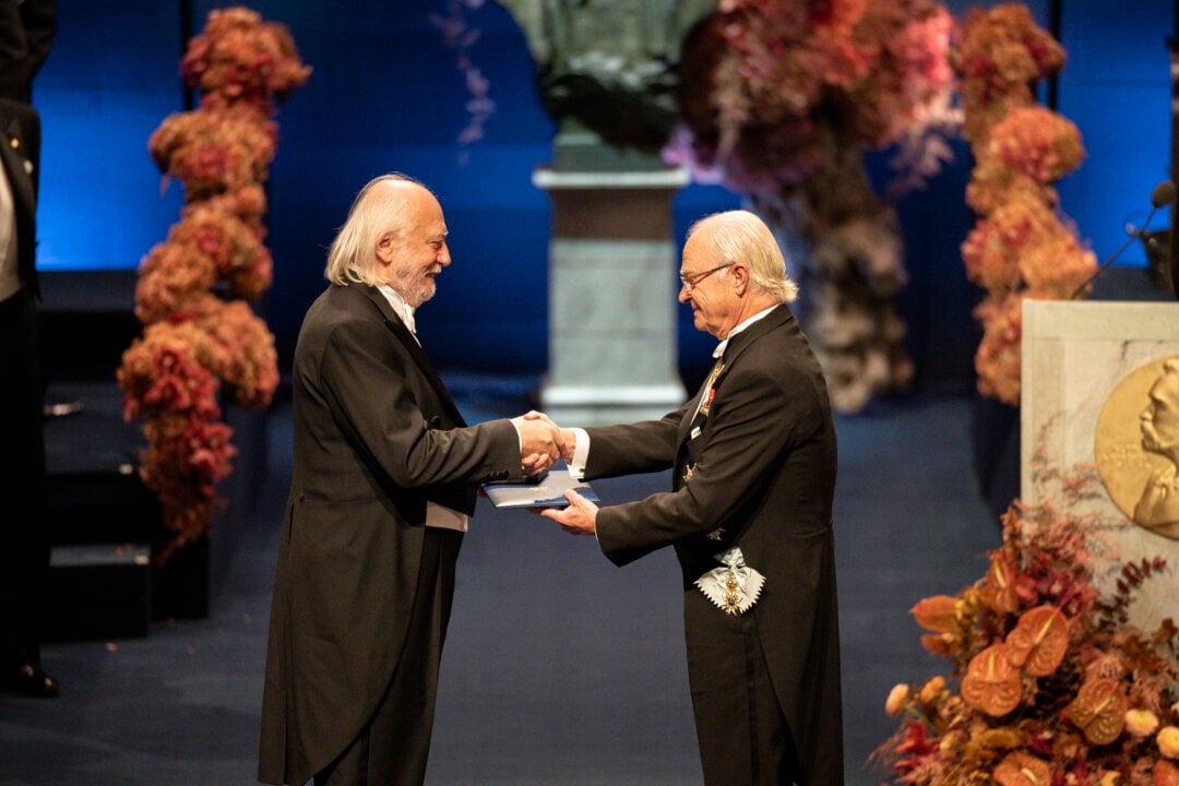 A man receiving a prize