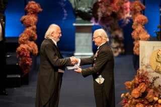 A man receiving a prize