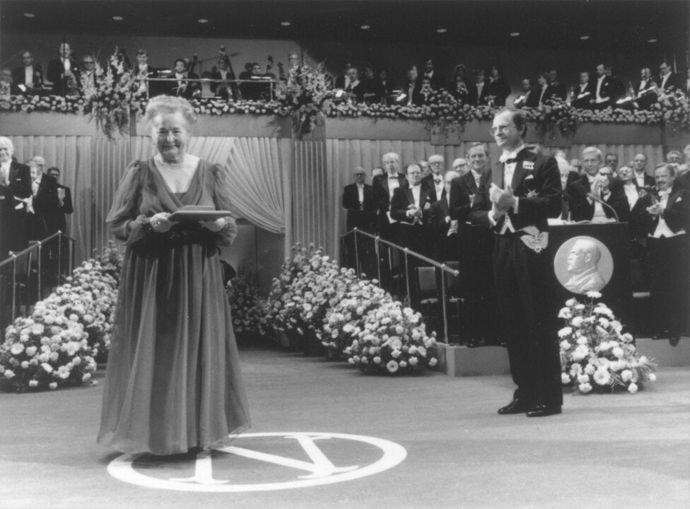 A woman at a prize award ceremony