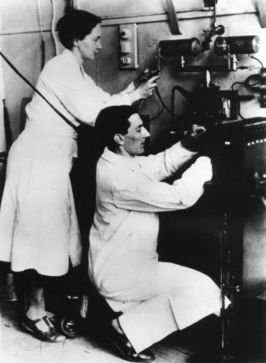 A man and a woman in a laboratory
