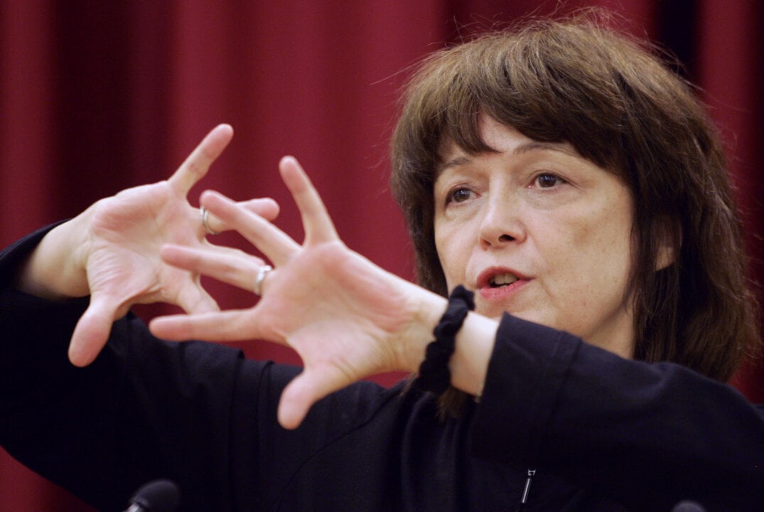 A woman describing something