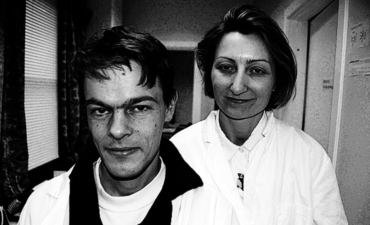 A man and a woman in a black-and-white photo