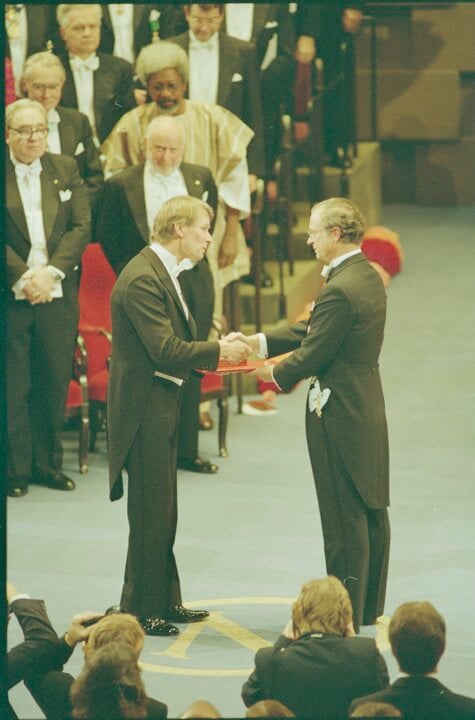 A man receiving a prize