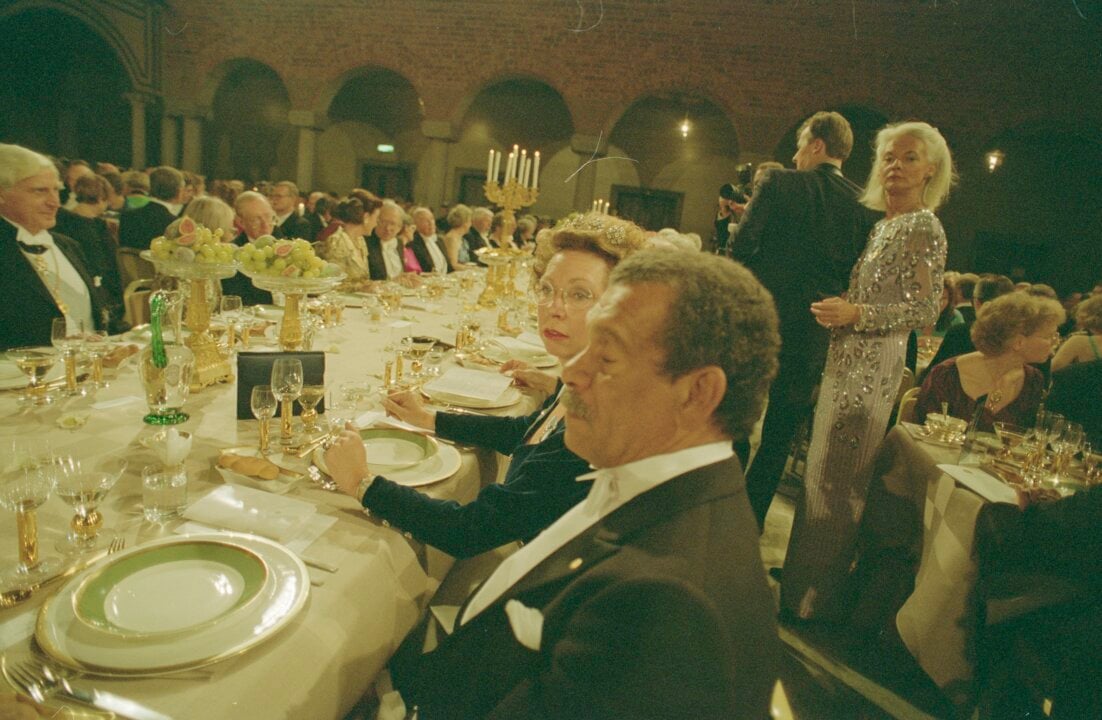 A man at a banquet table