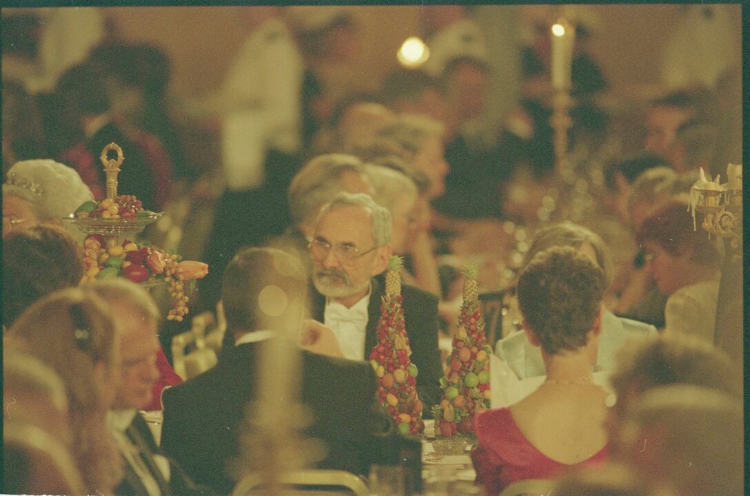 A man at a banquet table