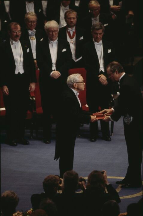 A man receiving a prize