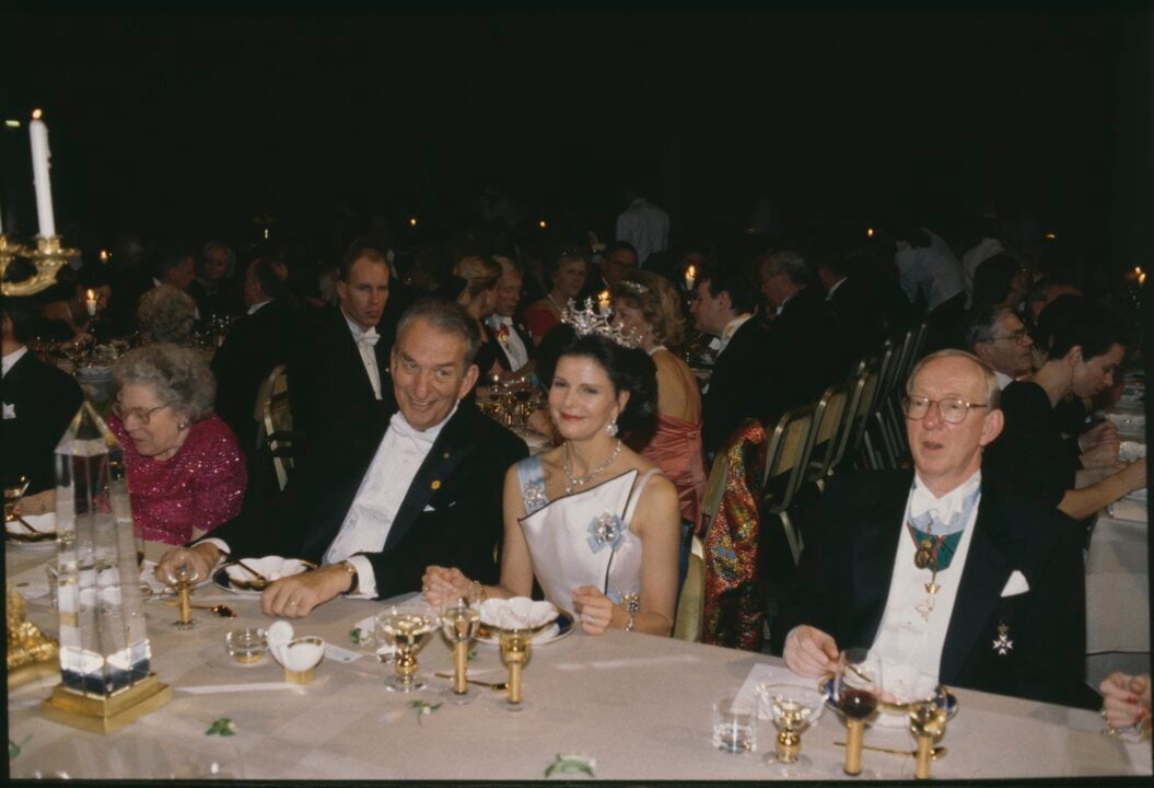 A man and a woman at a banquet table