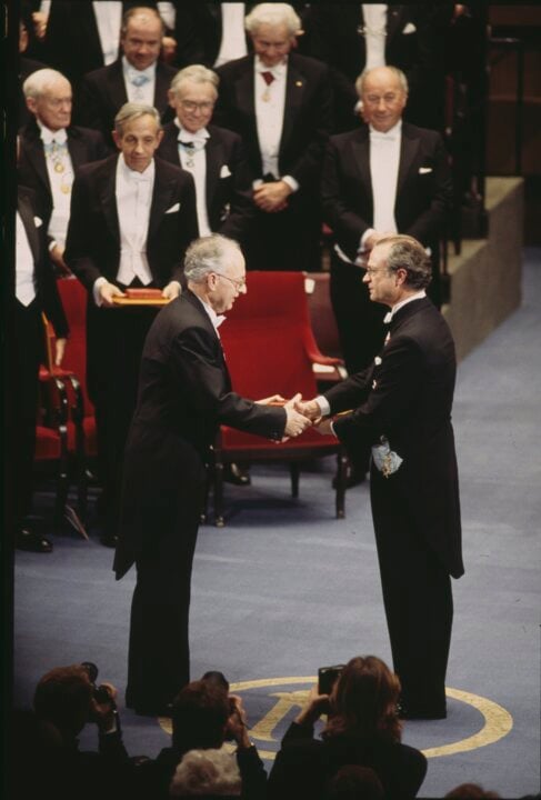 A man receiving a prize