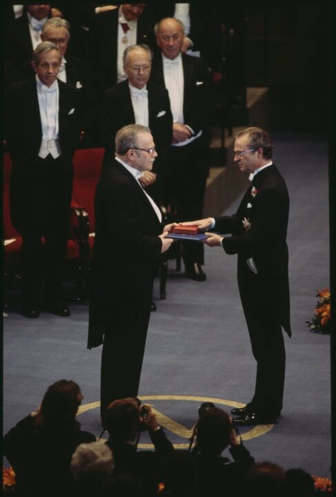 A man receiving a prize