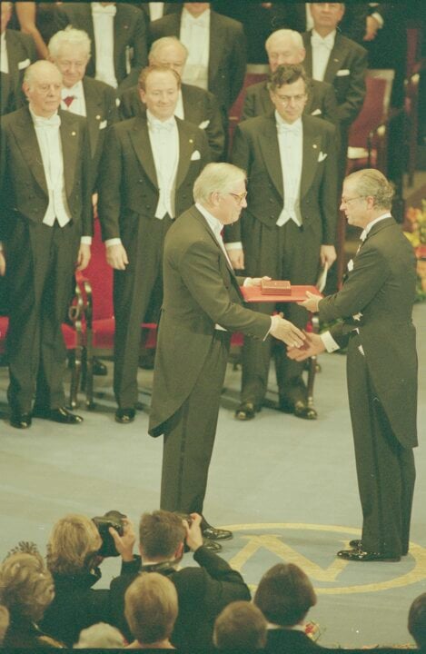 A man receiving a prize