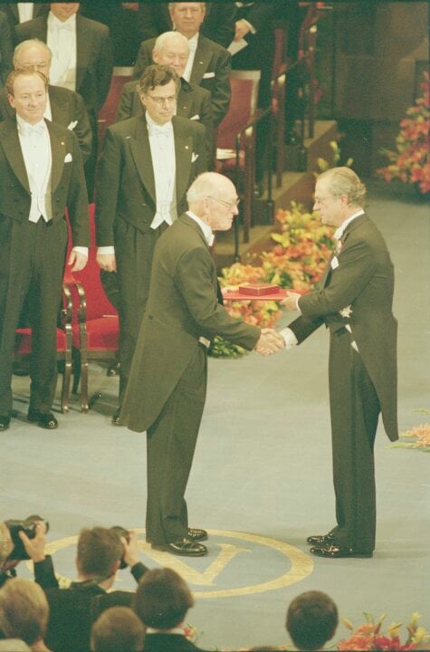 A man receiving a prize