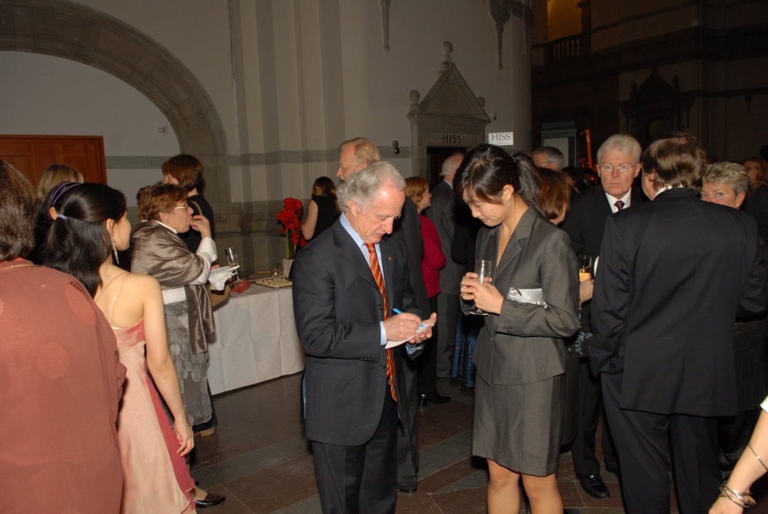 Mario R. Capecchi signing autographs