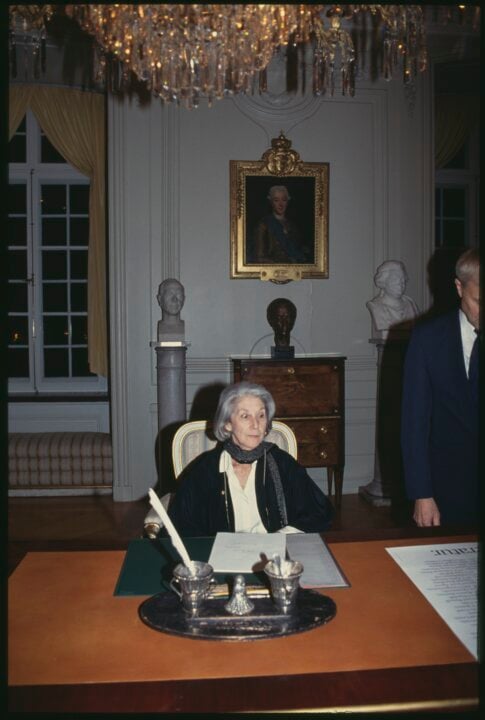 A woman sitting at a table