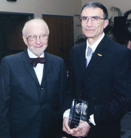 Aziz with his Ph.D. mentor Claud Rupert