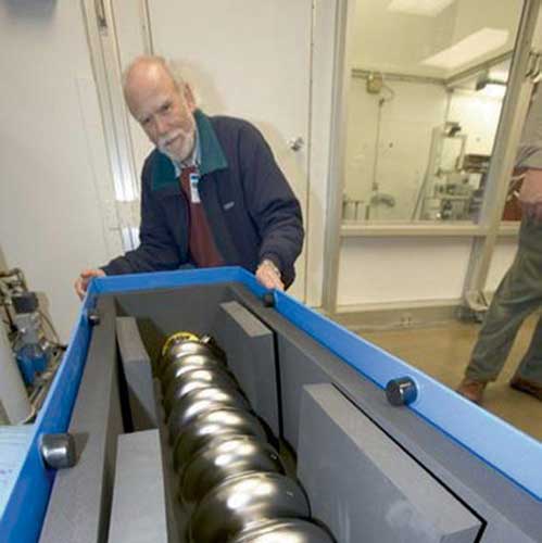 Inspecting superconducting cavities.