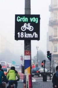 A photo of bright white signs for cyclists in Stockholm