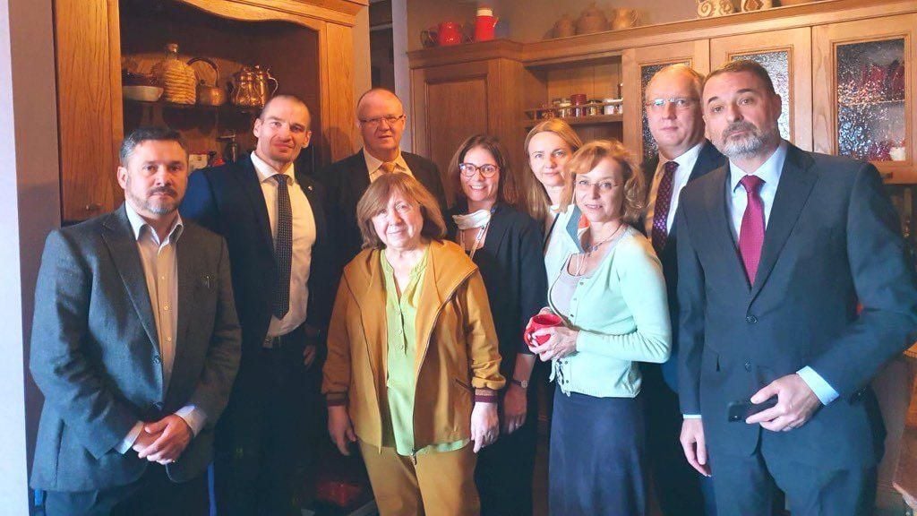 Svetlana Alexievich (centre) pictured at home in Minsk in 2020 surrounded by European diplomats.